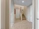 Bright entryway with tile flooring and staircase at 176 Kimberlite Dr, Henderson, NV 89011
