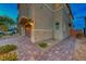 Side view of home showcasing stone accents and landscaping at 176 Kimberlite Dr, Henderson, NV 89011
