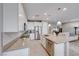 Modern kitchen with stainless steel appliances and light cabinets at 176 Kimberlite Dr, Henderson, NV 89011