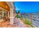 Brick paved patio with seating area, mountain views, and access to the interior at 176 Kimberlite Dr, Henderson, NV 89011