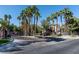 Gated community entrance with palm trees and landscaping at 1901 Summer Pine Ct # 101, Las Vegas, NV 89134