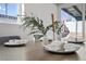 Light dining room featuring wood-look floors, modern décor, and natural light at 1940 E Golden Arrow Dr, Las Vegas, NV 89169