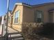 Street view of single Gathering home exterior featuring desert landscaping at 2605 Living Rock St, Las Vegas, NV 89106