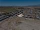 Expansive aerial view of a residential community with mountain views at 3543 E Wallowa Dr, Pahrump, NV 89061