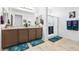 Bathroom featuring double sinks, ample counter space, and a glass-enclosed shower at 3543 E Wallowa Dr, Pahrump, NV 89061