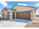 Charming single-story home with a well-maintained front yard and a two-car garage at 3543 E Wallowa Dr, Pahrump, NV 89061