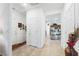 Hallway with tile flooring leads to a kitchen, showcasing the home's open layout at 3543 E Wallowa Dr, Pahrump, NV 89061