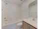 Bright bathroom with a shower-tub combo, vanity, and white toilet at 3634 Tripoli Cove Ave, Las Vegas, NV 89106