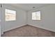 Simple bedroom with neutral decor, carpeted floor, and window at 3634 Tripoli Cove Ave, Las Vegas, NV 89106