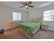 Bright bedroom with carpeted floor, ceiling fan, and window blinds at 3634 Tripoli Cove Ave, Las Vegas, NV 89106