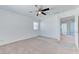 Comfortable bedroom featuring neutral carpet and window with natural light at 3634 Tripoli Cove Ave, Las Vegas, NV 89106