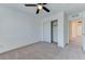 Bright bedroom featuring carpet flooring, white walls, and a closet with sliding doors at 3634 Tripoli Cove Ave, Las Vegas, NV 89106