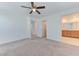 Spacious bedroom with neutral carpet and ensuite bathroom featuring double sinks at 3634 Tripoli Cove Ave, Las Vegas, NV 89106