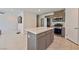 Contemporary kitchen featuring island and stainless steel appliances at 3634 Tripoli Cove Ave, Las Vegas, NV 89106