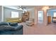 Spacious loft area with seating and built-in shelving at 3634 Tripoli Cove Ave, Las Vegas, NV 89106