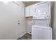 Laundry room features a stacked washer and dryer at 3950 S Sandhill Rd # 112, Las Vegas, NV 89121