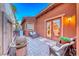 Cozy courtyard featuring patio furniture, water feature and stone pavers for outdoor enjoyment at 453 Via Palermo Dr, Henderson, NV 89011