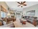 Spacious living room with fireplace and comfortable seating at 5130 Stone Cove St, North Las Vegas, NV 89081