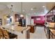 Modern kitchen offers granite counters, stainless steel appliances, and a breakfast bar at 5805 Hannah Brook St, North Las Vegas, NV 89081
