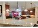 Kitchen boasts granite countertops, stainless steel appliances, and ample cabinet space at 5805 Hannah Brook St, North Las Vegas, NV 89081