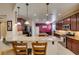 Stylish kitchen featuring granite counters, pendant lighting, and stainless steel appliances at 5805 Hannah Brook St, North Las Vegas, NV 89081