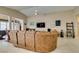 Bright living room with tile flooring, neutral paint, and open layout concept at 5805 Hannah Brook St, North Las Vegas, NV 89081