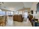 Spacious living room with tile floors, large windows, and an open layout for entertaining at 5805 Hannah Brook St, North Las Vegas, NV 89081