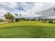 Expansive putting green with lush green turf, ideal for practicing your short game at 5805 Hannah Brook St, North Las Vegas, NV 89081