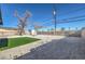 Backyard with gravel, artificial turf, and trees at 617 Carpenter Dr, Las Vegas, NV 89107