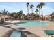 Community pool with lounge chairs and a shaded seating area at 636 Yacht Harbor Dr # 203, Las Vegas, NV 89145