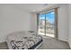 Bedroom with private balcony access and a view at 655 Solar Citrine St, Las Vegas, NV 89138