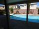 Inviting backyard swimming pool offers a refreshing escape with privacy fencing at 6604 Octave Ave, Las Vegas, NV 89139