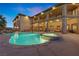 Spacious backyard with large pool, hot tub and covered patio for entertaining at 670 Du Fort Ave, Henderson, NV 89002