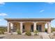 Charming, single story home with a stone facade, covered porch, and low maintenance desert landscaping at 670 Du Fort Ave, Henderson, NV 89002