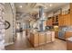 Well-appointed kitchen featuring granite countertops, a central island, and modern stainless steel appliances at 670 Du Fort Ave, Henderson, NV 89002