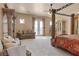 Expansive main bedroom with sitting area and balcony access showcasing luxury finishes at 670 Du Fort Ave, Henderson, NV 89002