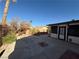 Backyard with patio and desert landscaping at 7588 Kalmalii Ave, Las Vegas, NV 89147