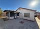 Large backyard with patio and sunroom at 7588 Kalmalii Ave, Las Vegas, NV 89147