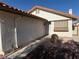 House with a well-maintained front yard and walkway to the entrance at 7588 Kalmalii Ave, Las Vegas, NV 89147