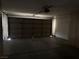 Spacious two-car garage with ample storage cabinets at 7588 Kalmalii Ave, Las Vegas, NV 89147