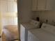 Laundry room with washer and dryer, and additional storage at 7588 Kalmalii Ave, Las Vegas, NV 89147