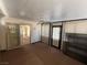 Sunroom with access to backyard and ceiling fan at 7588 Kalmalii Ave, Las Vegas, NV 89147
