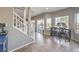 Cozy dining area near staircase with sliding glass doors to the backyard, and a coffee bar at 7936 Tolberts Mill Dr, Las Vegas, NV 89131