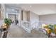 Upstairs landing offering additional seating and natural light at 7936 Tolberts Mill Dr, Las Vegas, NV 89131