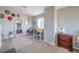 This office area features neutral walls, carpet, decor, a mirror, and a desk for work at 7936 Tolberts Mill Dr, Las Vegas, NV 89131