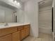 Clean bathroom with a vanity and shower-tub combination at 840 Candido Garcia Ave, Henderson, NV 89015