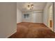 Spacious bedroom featuring neutral walls and carpet, complemented by a ceiling fan at 840 Candido Garcia Ave, Henderson, NV 89015