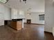 Bright, open living area with tile floors and a cozy fireplace at 840 Candido Garcia Ave, Henderson, NV 89015