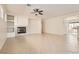 Inviting living room with tile floors, neutral walls, recessed lights, fireplace, and an open layout at 8633 Sherwood Park Dr, Las Vegas, NV 89131