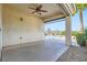 Covered patio area with ceiling fan overlooking the pool at 8633 Sherwood Park Dr, Las Vegas, NV 89131